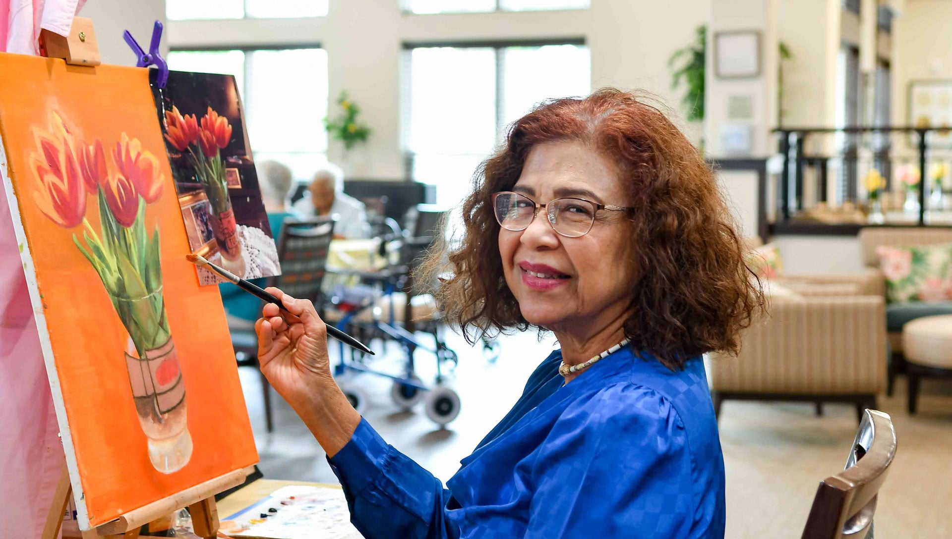 Sequoia Grove resident painting